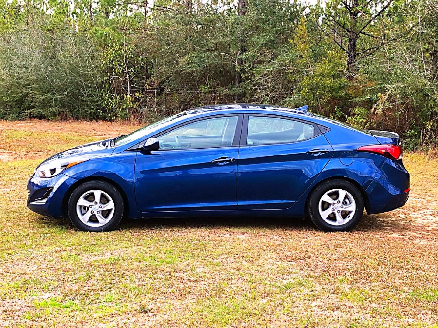 2015 Blue Hyundai Elantra Limited (5NPDH4AE9FH) with an 1.8L L4 DOHC 16V engine, 6-Speed Automatic transmission, located at 18001 Kellogg Rd, Saucier, MS, 39574, (228) 832-1441, 39.421459, -76.641457 - 2015 HYUNDAI ELANTRA LIMITED *** MECHANIC SPECIAL *** {{{ CRACKED HEAD, MOTOR KNOCK }}} – CLEAN TITLE – 1.8L L4 DOHC 16V – Automatic Trans. – AM // FM // XM // CD // Bluetooth Stereo – Nice CLEAN Interior - well kept – ICE COLD A/C – CRUISE Control – ALLOY Wheels – POW - Photo#1